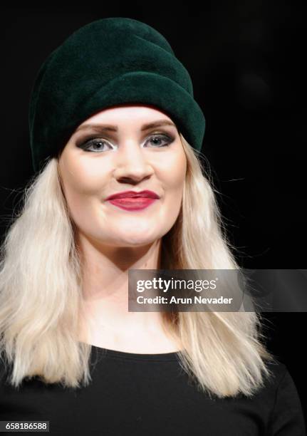 Model walks the runway wearing Hattitude by Christina Lichy at Vancouver Fashion Week Fall/Winter 2017 at Chinese Cultural Centre of Greater...