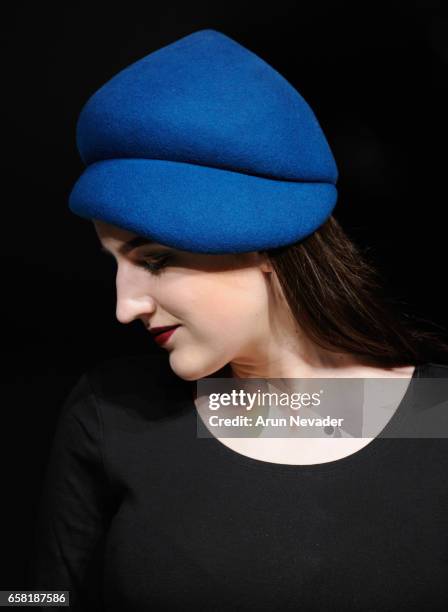 Model walks the runway wearing Hattitude by Christina Lichy at Vancouver Fashion Week Fall/Winter 2017 at Chinese Cultural Centre of Greater...