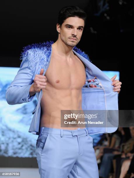 Model walks the runway wearing Armine Ohanyan at Vancouver Fashion Week Fall/Winter 2017 at Chinese Cultural Centre of Greater Vancouver on March 26,...