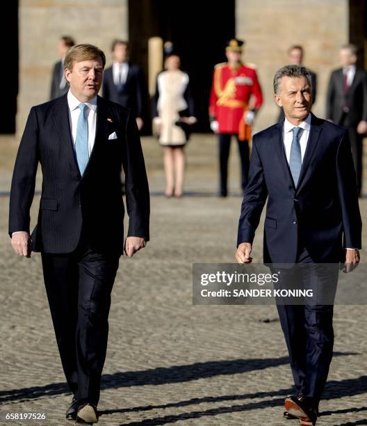 Dutch king Willem-Alexander welcomes Argentinian president Mauricio Macri on the Dam Square in Amsterdam, on March 27 at the start of his two-day...