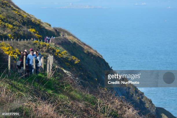 People enjoy Bray-Greystones cliff walk. On Sunday, March 26 in Bray, Ireland.