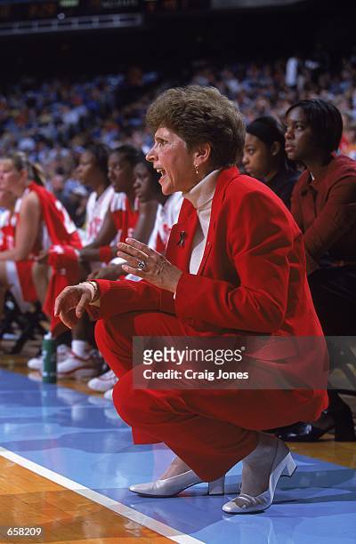 Head Coach Kay Yow of the North Carolina State Wolfpack watches from the sidelines during the game against the North Carolina Tar Heels at the Dean...