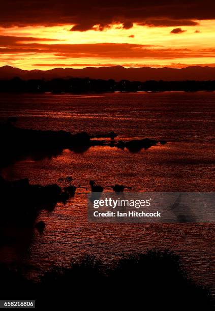 Sunset is shown at Kissing Point, Townsville as Cyclone Debbie approaches the North Queensland coast on March 27, 2017 in Townsville, Australia....