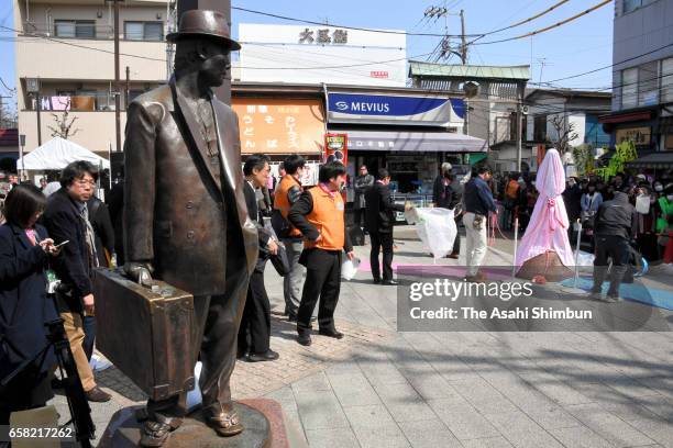 Bronze statue of Sakura is unveiled near the statue of her brother Tora-san, the protagonist of the "Otoko wa Tsuraiyo" film series, in Tokyo's...