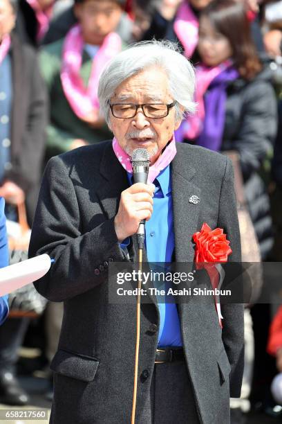 Film director Yoji Yamada speaks during the unveiling ceremony of a bronze statue of Sakura near the statue of her brother Tora-san, the protagonist...