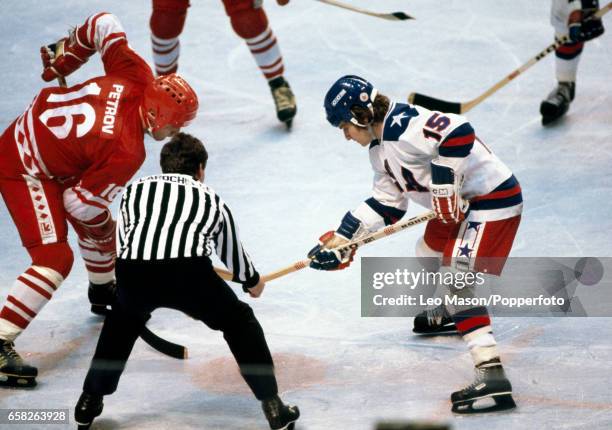 Action during the semi-final ice hockey match between the Soviet Union and the United States at the Winter Olympic Games in Lake Placid, New York on...