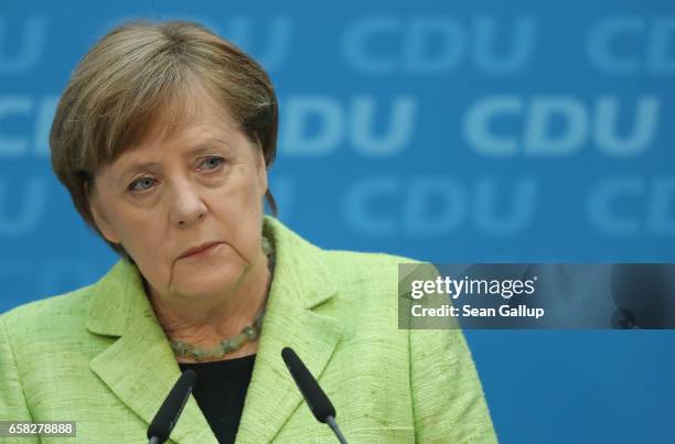 German Chancellor and Chairwoman of the German Christian Democrats Angela Merkel speaks to the media at CDU headquarters the day after state...