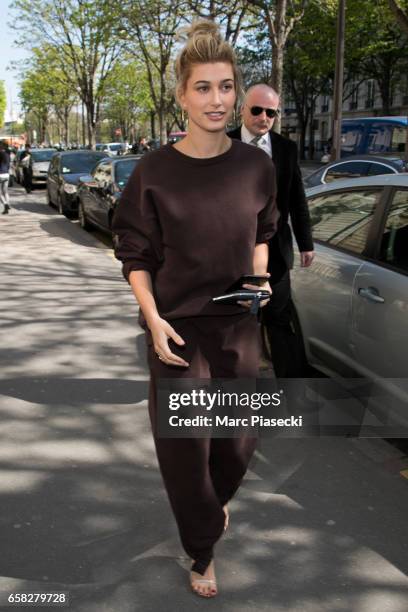 Model Hailey Baldwin is spotted on Avenue Montaigne on March 27, 2017 in Paris, France.