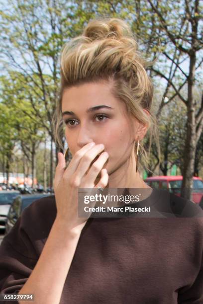 Model Hailey Baldwin is spotted on Avenue Montaigne on March 27, 2017 in Paris, France.