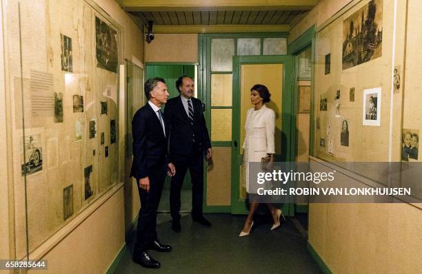 Argentinian president Mauricio Macri and his wife Juliana Awada , visit the Anne Frank House during a state visit in Amsterdam on March 27, 2017. /...