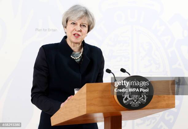 Prime Minister Theresa May delivers a speech at the Department for International Development's office at Abercrombie House on March 27, 2017 in East...