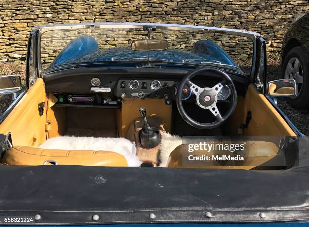 Kate Moss MGB roadster classic car, kitted out with retro fluffy seat covers, in the Cotswold , on March 25, 2017 in Gloucestershire , England.