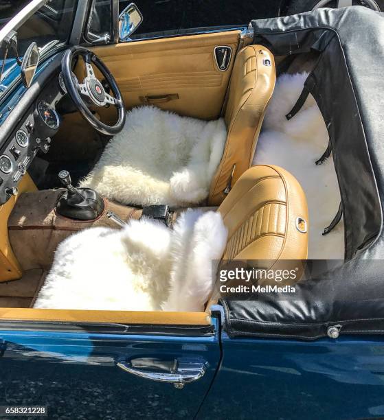 Kate Moss MGB roadster classic car, kitted out with retro fluffy seat covers, in the Cotswold , on March 25, 2017 in Gloucestershire , England.