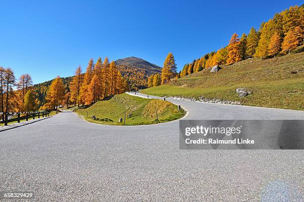 mountain pass with hairpin curve - graubunden canton stock pictures, royalty-free photos & images