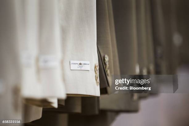 Joseph Abboud Manufacturing Corp. Label is displayed on the arm of a jacket at the company's facility in New Bedford, Massachusetts, U.S., on...