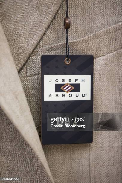 Joseph Abboud Manufacturing Corp. Tag is displayed on a jacket at the company's facility in New Bedford, Massachusetts, U.S., on Wednesday, March 22,...