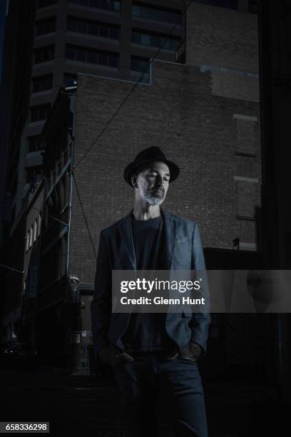 Image was altered with digital filters.) Australian author and poet Brentley Frazer poses during a portrait session on March 26, 2017 in Brisbane,...