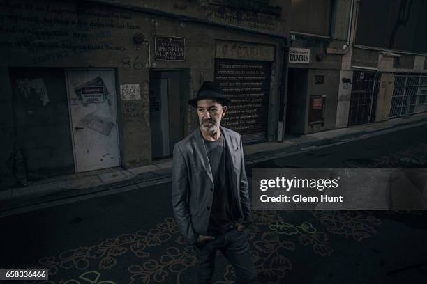 Image was altered with digital filters.) Australian author and poet Brentley Frazer poses during a portrait session on March 26, 2017 in Brisbane,...