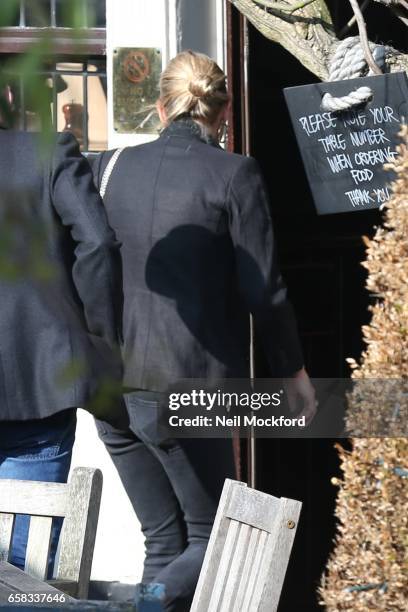 Kate Moss seen heading out to The Flask pub in Highgate on March 27, 2017 in London, England.