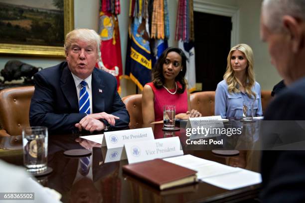 President Donald Trump speaks as U.S. Vice President Mike Pence, from right, Ivanka Trump, daughter of Trump, and Jessica Johnson, president of...