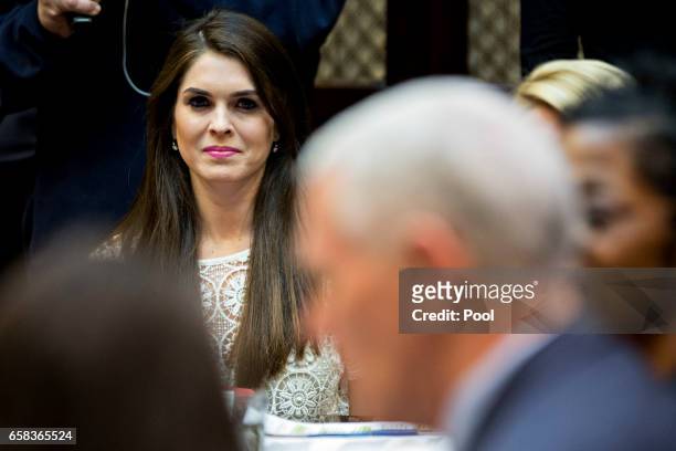Hope Hicks, White House director of strategic communications, listens while meeting with women small business owners with U.S. President Donald...