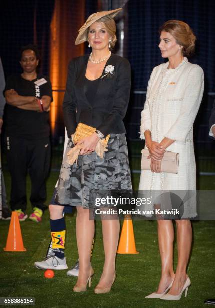 Queen Maxima of The Netherlands and Juliana Awada visit the Hockey Clinics in the Beurs van Berlage on March 27, 2017 in Amsterdam, The Netherlands....