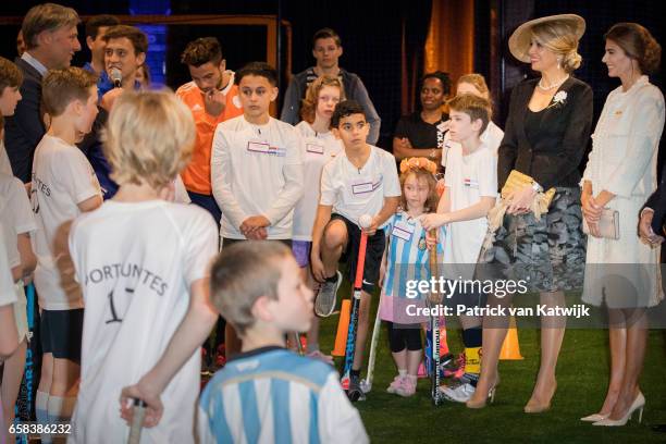 Queen Maxima of The Netherlands and Juliana Awada visit the Hockey Clinics in the Beurs van Berlage on March 27, 2017 in Amsterdam, The Netherlands....