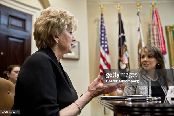 Linda McMahon, administrator of the Small Business Administration , left, speaks while meeting with U.S. President Donald Trump, not pictured, and...