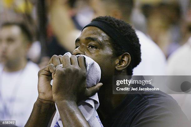 Chris Webber of the Sacramento Kings sits on the bench in Game seven of the Western Conference Finals against the Los Angeles Lakers during the 2002...