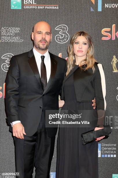 Marco D'Amore and Daniela Maiorana walk the red carpet of the 61. David Di Donatello on March 27, 2017 in Rome, Italy.