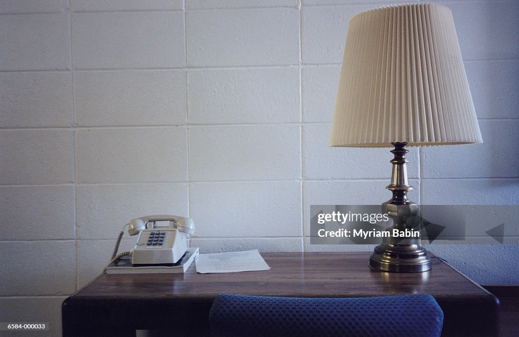 Phone and Lamp on Desk