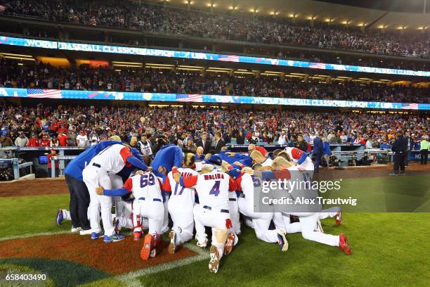 Team Puerto Rico huddles after losing Game 3 of the Championship Round of the 2017 World Baseball Classic against Team USA on Wednesday, March 22,...