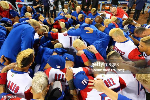 Team Puerto Rico huddles after losing Game 3 of the Championship Round of the 2017 World Baseball Classic against Team USA on Wednesday, March 22,...