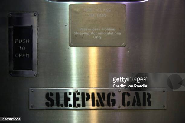 Sign on a door of Amtrak's California Zephyr train guides passengers to the sleeping car as it makes a daily 2,438 miles run to Emeryville/San...