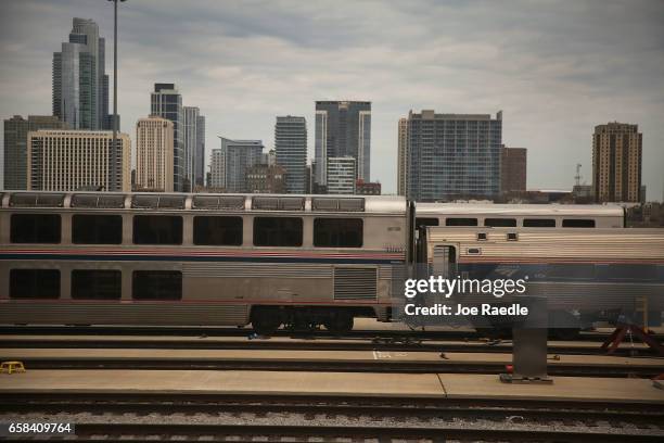 Amtrak's California Zephyr train leaves the city as it begins a daily 2,438-mile trip to Emeryville/San Francisco that takes roughly 52 hours on...