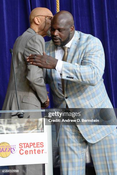Kareem Abdul-Jabbar and Shaquille O'Neal hug during the Los Angeles Lakers unveiling of the Shaquille O'Neal statue on March 24, 2017 at STAPLES...