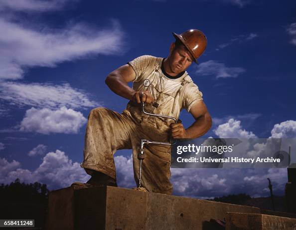 Carpenter Working on TVA's Douglas Dam, French Broad River, Sevier County, Tennessee, June 1942