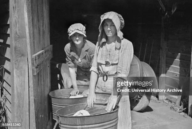 Two Women Washing Clothes, Crabtree Recreational Project, near Raleigh, North Carolina, USA, Carl Mydans for U.S. Resettlement Administration, March...