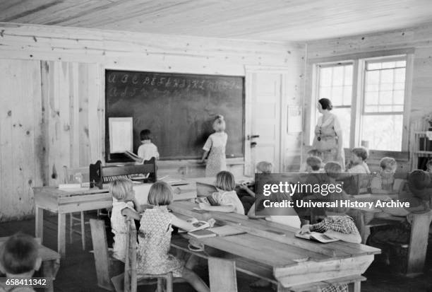Classroom Scene, Cumberland Mountain Farms, near Scottsboro, Alabama, USA, Carl Mydans for U.S. Resettlement Administration, June 1936.