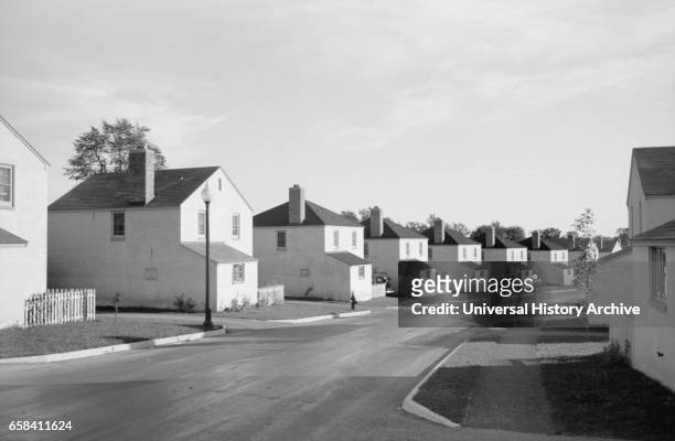 Row of Identical Suburban Houses, Greendale, Wisconsin, USA, John Vachon for Farm Security Administration, September 1939.