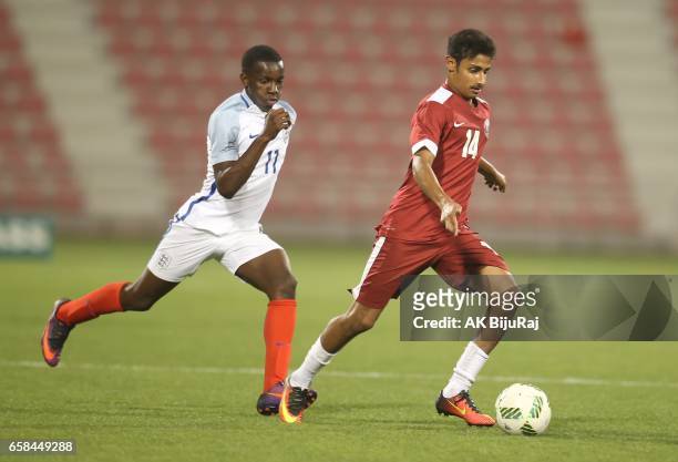 Ahmed Al Ganehi of Qatar in action against Edward Nketiah of England during the U18 International friendly match between Qatar and England at the...