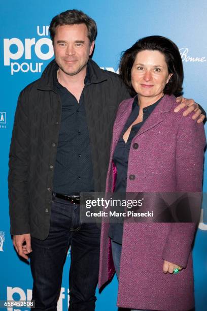 Actor Guillaume de Tonquedec and wife Christele de Tonquedec attend 'Un Profil pour Deux' Premiere at Cinema UGC Normandie on March 27, 2017 in...