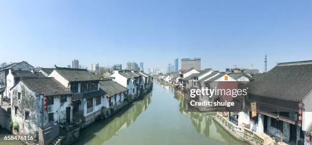 wuxi qingming ancient canal bridge scenic area - 中国文化 stock pictures, royalty-free photos & images