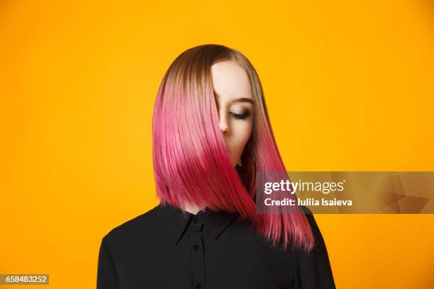 girl with dyed hair waving head - multi coloured hair stock pictures, royalty-free photos & images