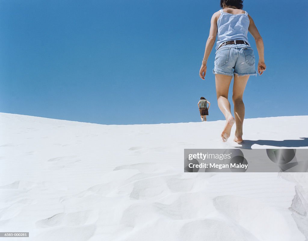 Women Walking in Desert