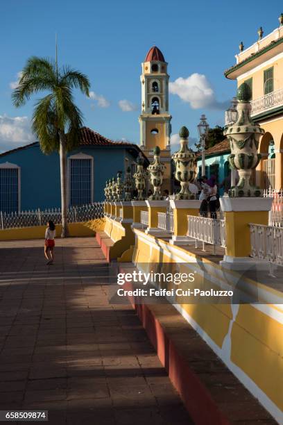 a young girl at plaza mayor of old town trinidad, cuba - 19 century town girl stock pictures, royalty-free photos & images