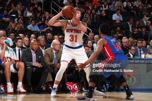 Ron Baker of the New York Knicks handles the ball during a game against the Detroit Pistons on March 27, 2017 at Madison Square Garden in New York...