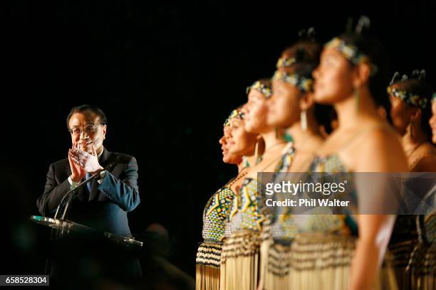 Chinese Premier Li Keqiang watches a maori cultural performance during a Trade and Enterprise function at the Langham Hotel on March 28, 2017 in...