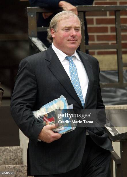 Kennedy cousin Michael Skakel leaves Norwalk Superior Court for a lunch break during the Martha Moxley murder trial June 6, 2002 in Norwalk,...