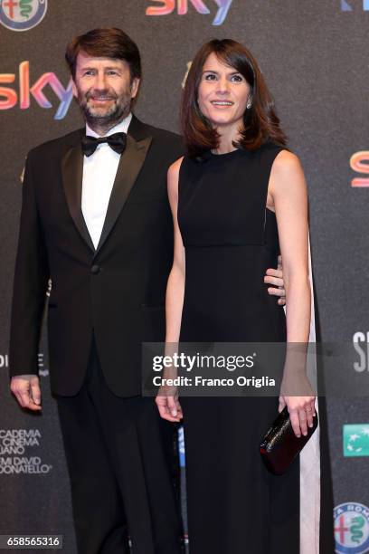 Dario Franceschini and a guest walk the red carpet of the 61. David Di Donatello on March 27, 2017 in Rome, Italy.